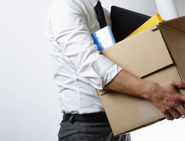 Man carrying box of personal effects