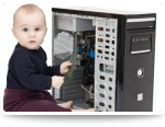 Infant playing with computer