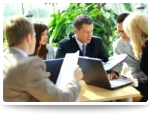 professionals seated around a table